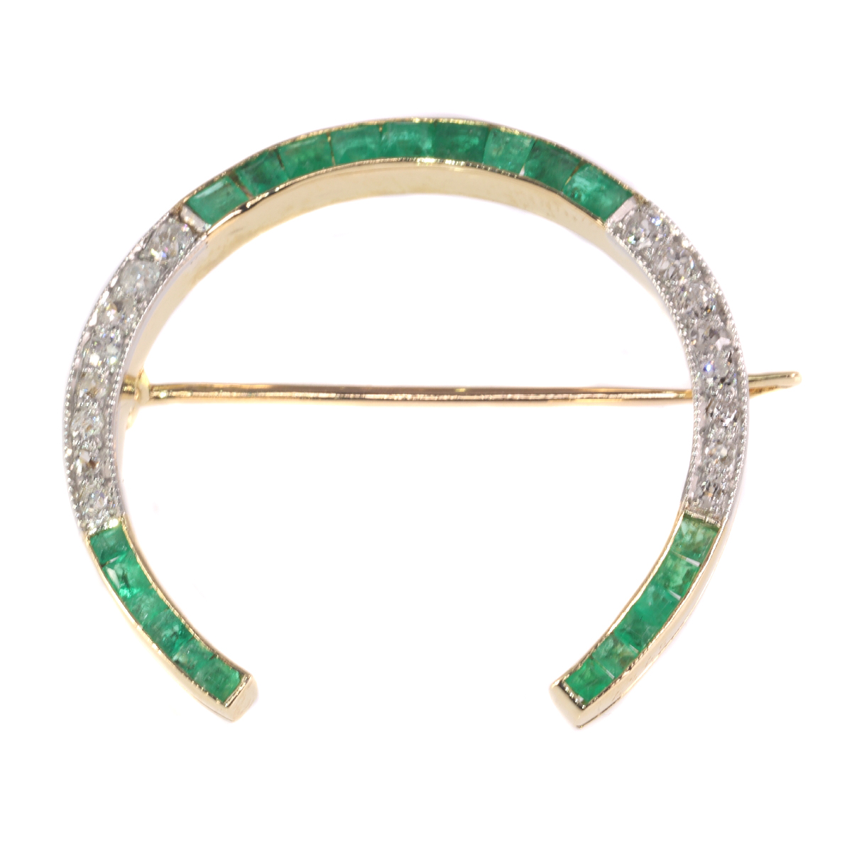 Vintage Art Deco horse shoe brooch set with diamonds and emeralds